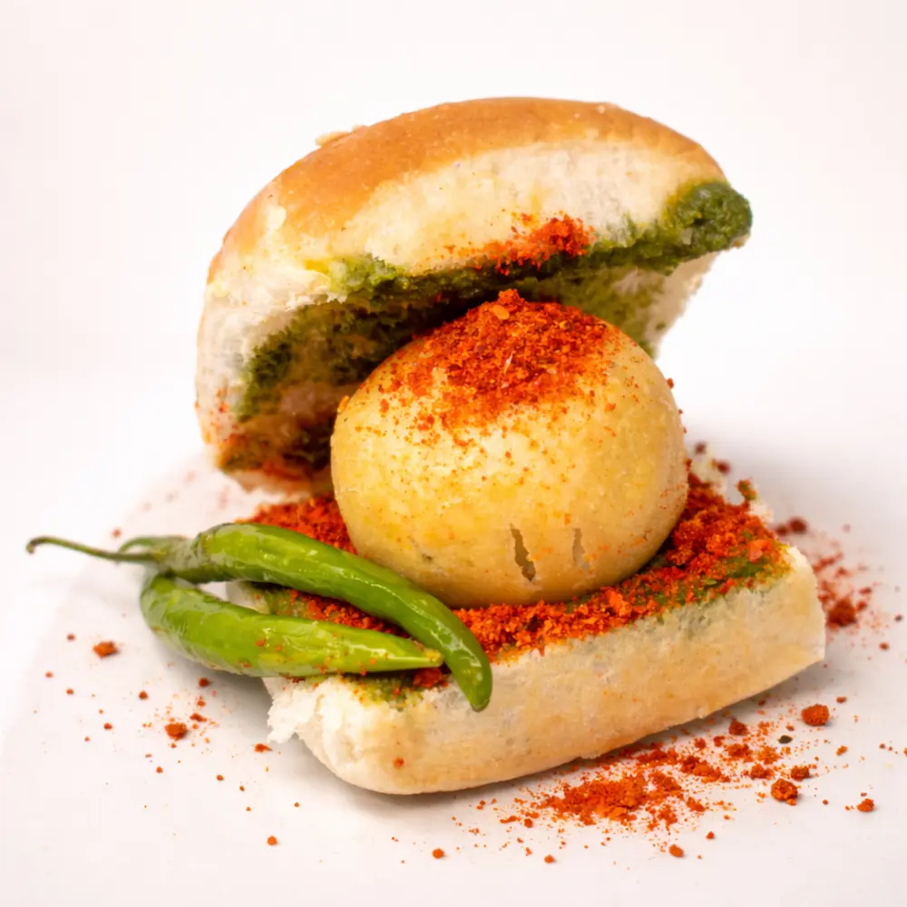 Spiced mashed potato fritter with garlic chutney flavors